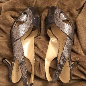 Silver sling back open toe shoes